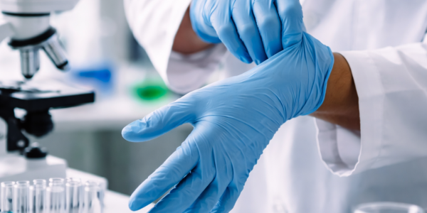 What are laboratory gloves used for and what types are there?